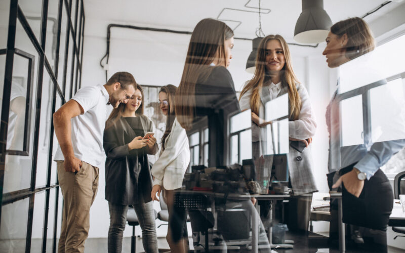 Group of people working out business plan in an office